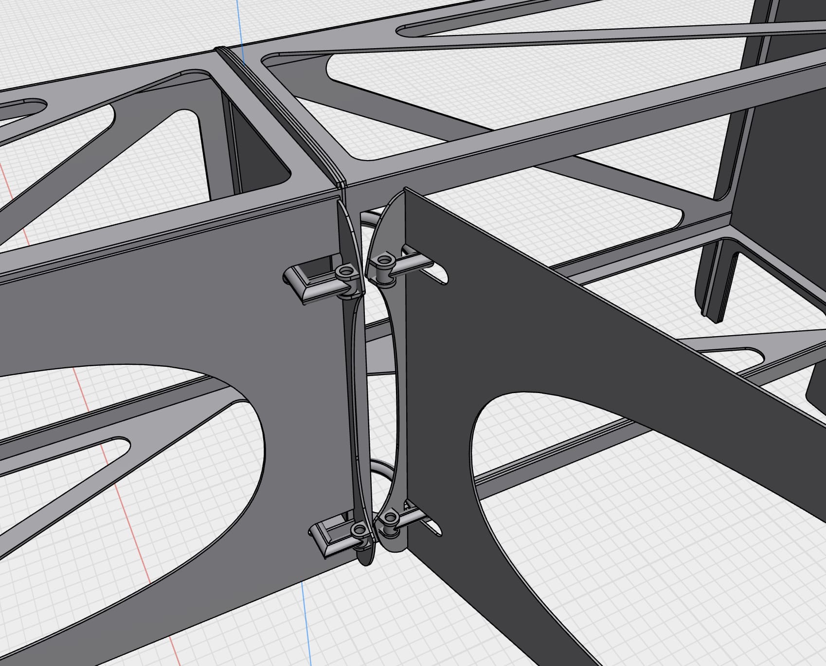 CAD model of a lattice-frame chassis structure with hinge joints