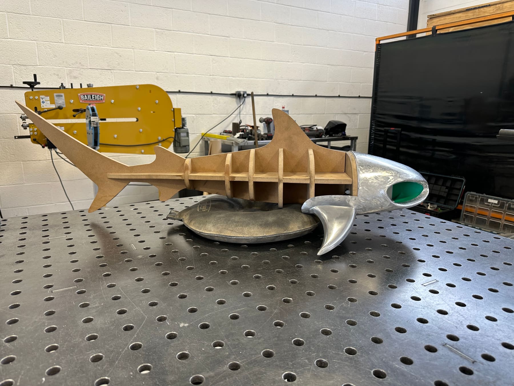 Wooden buck pattern for the Turbo Dolphin sculpture with an aluminium nose section attached