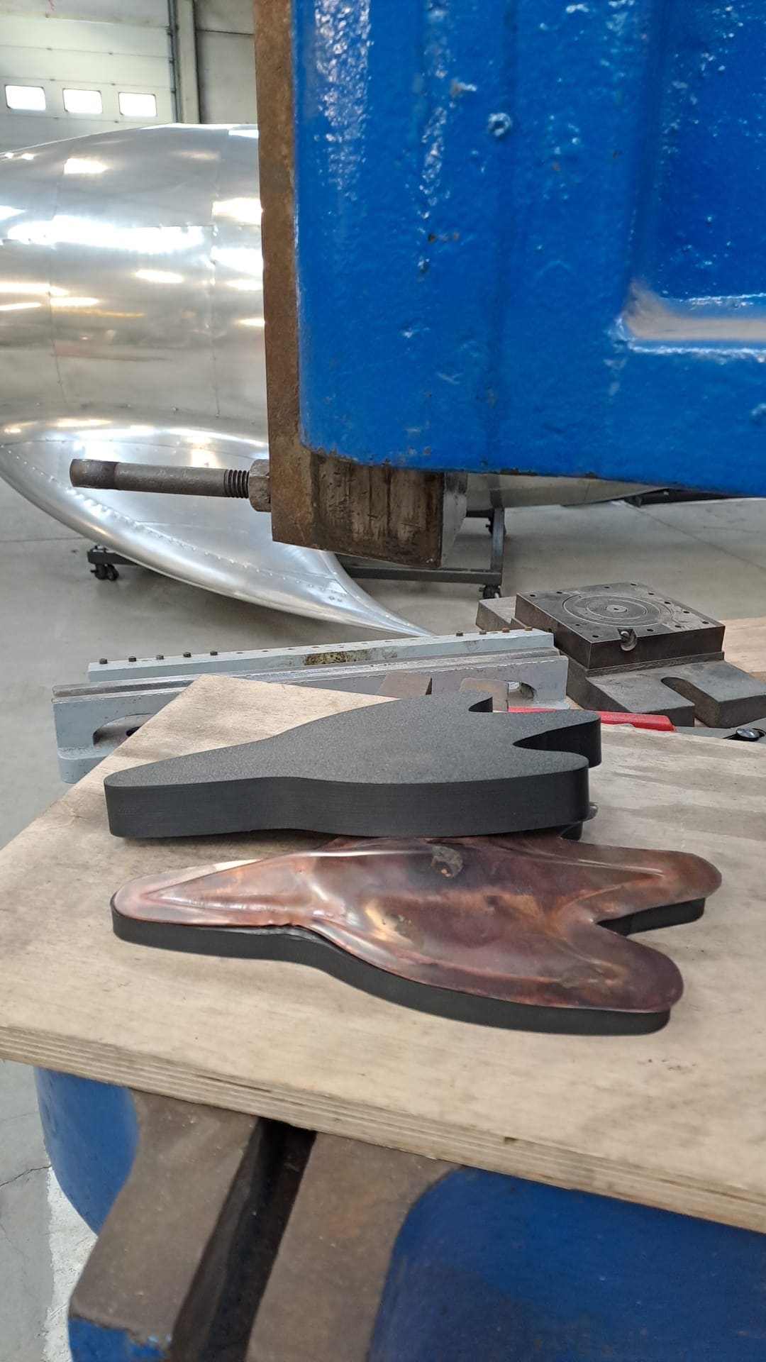 Wooden and hand-finished pattern bucks used to shape a body panel